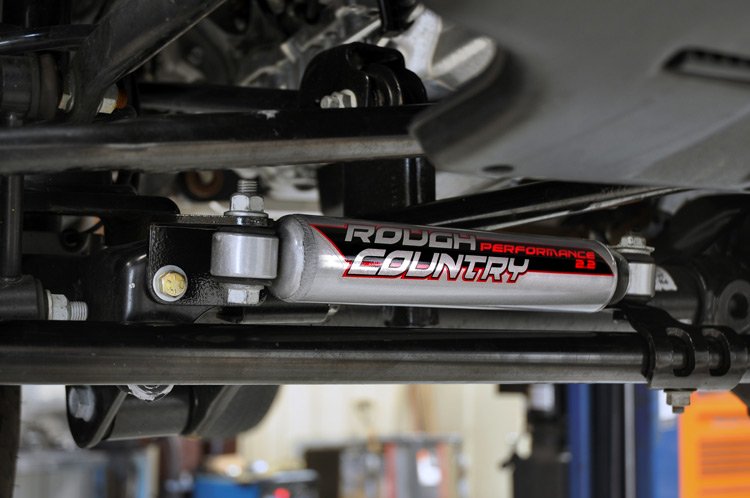 Rough Country | Steering Stabilizer Bracket | Jeep Stabilizer Relocation Bracket 07-18 Wrangler JK Rough Country | 1108