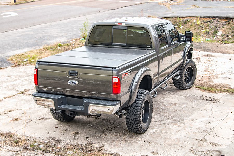 Rough Country | Tonneau Covers|Truck Bed|Exterior Parts & Car Care | Ford Hard Tri-Fold Bed Cover 99-16 F-250/350-6.5 Foot Bed w/o Cargo Mgmt Rough Country | 45599650