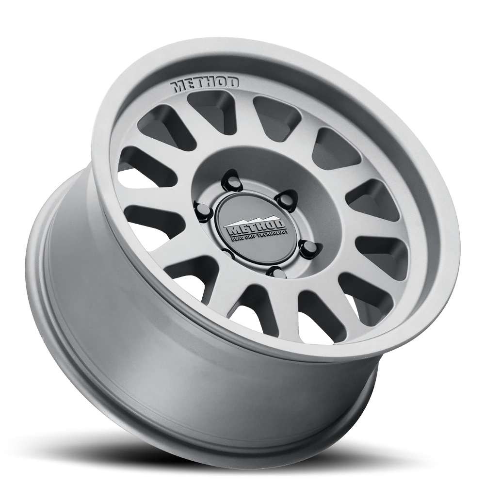 METHOD WHEELS | Aluminum Wheels 15x7 Bead Grip MR703 Bolt Pattern 5 On 100 Offset 15 Lip Size 1.18 Gloss Titanium SL Method | MR70357051815